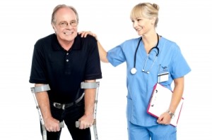 nurse walking with patient who has crutches