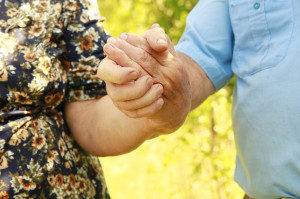 a woman and a man holding hands 