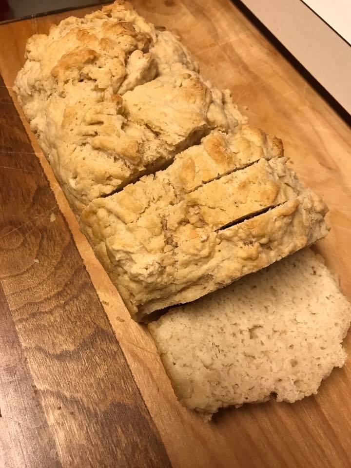 a loaf of partl-sliced beer batter bread
