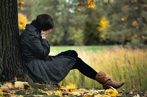 Young woman having autumn depression and