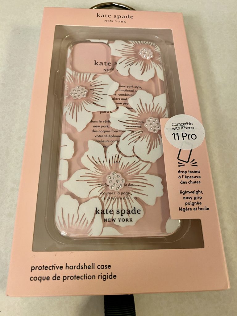 Clear Kare Spade case for the iPhone 11 Pro with white flowers and some crystals