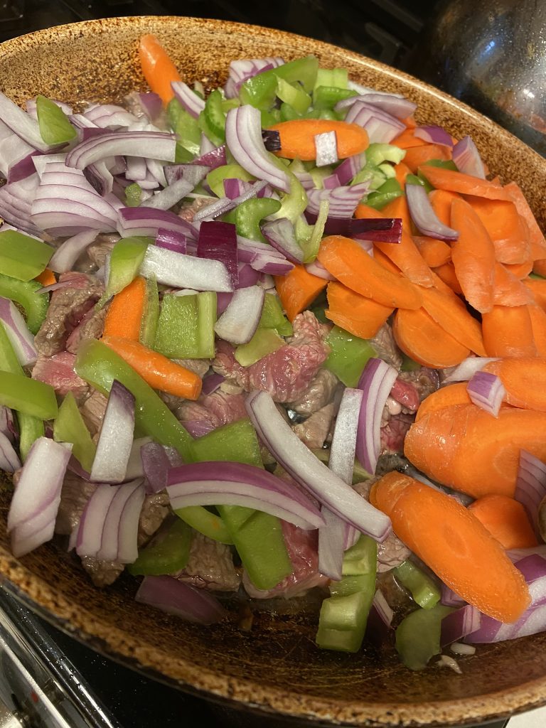 cut veggies in a saute' pan