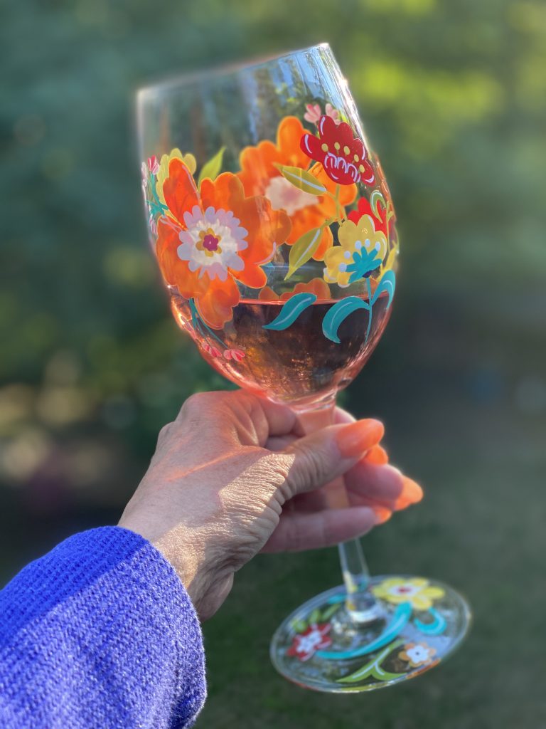 Rose in a decorated wine glass