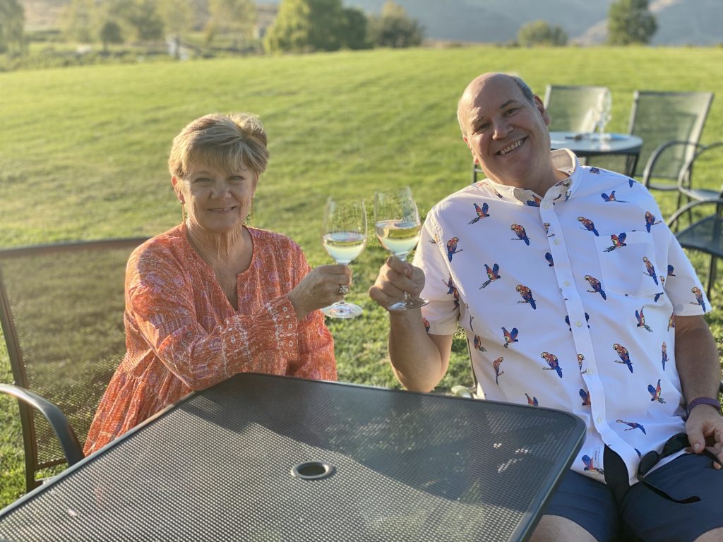 Phil and Shelley toasting a chenin blanc outside the tasting room