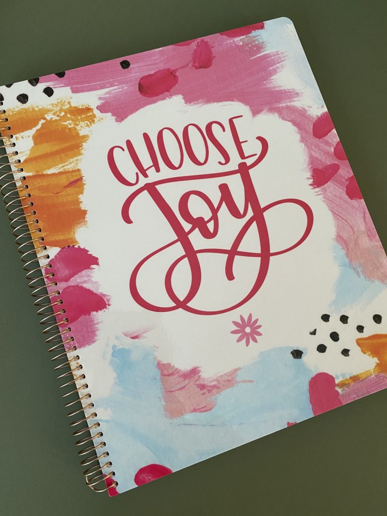 Choose Joy on the cover of a Bloom planner