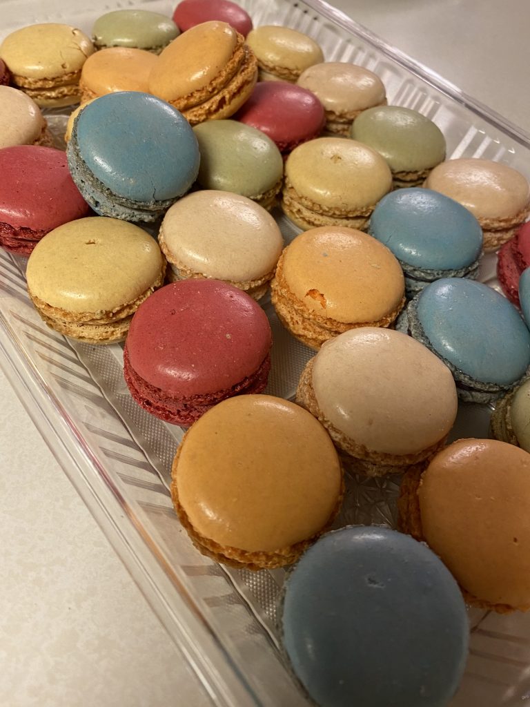 A plate of multi-colored macarons