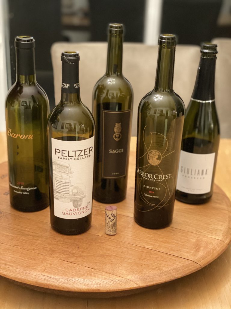 5 bottles of wine on a lazy susan