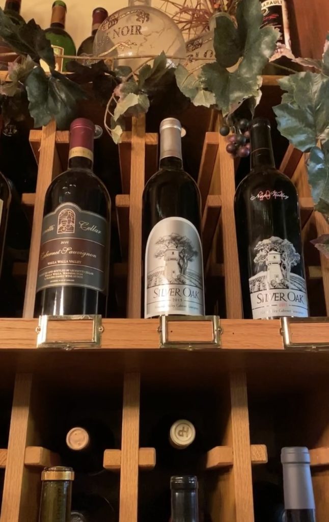 wine bottles in wine cubby featuring Silver Oak