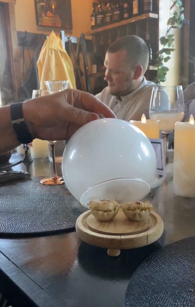 Smoked Scallop in Phyllo underneath a smoking globe