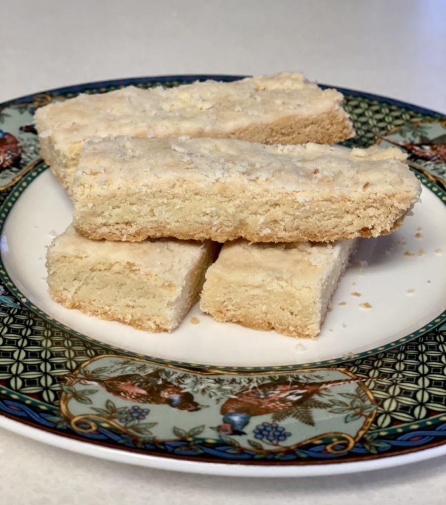 4 Ted Lasso biscuits on a patterned plate