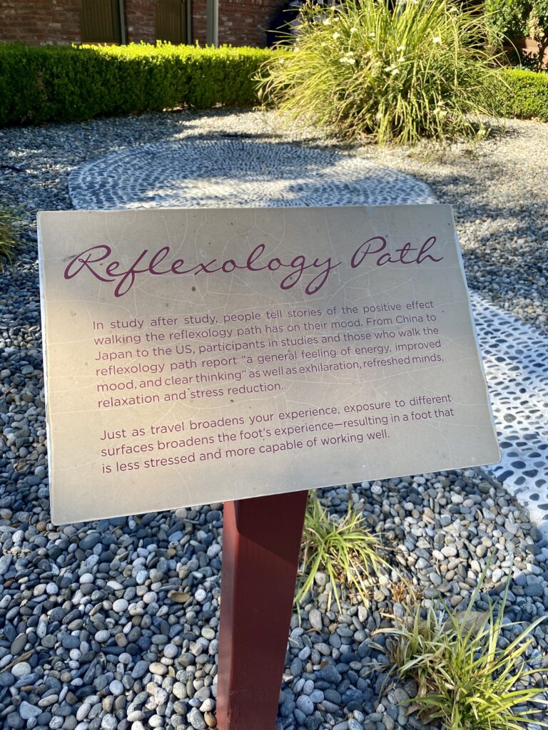 The sign explaining the reflexology path
