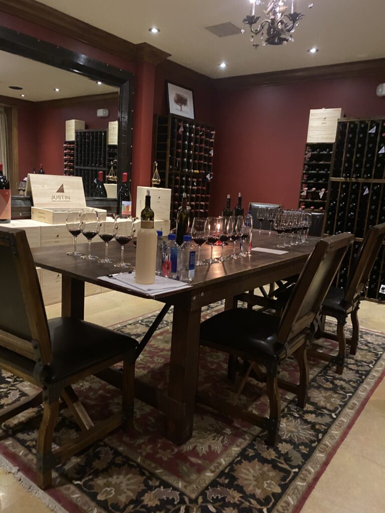 The table in the tasting room at Justin Winery set up for a grand tasting