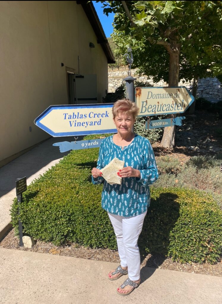 Shelley standing at the entrance to Tablas Creek tasting room.