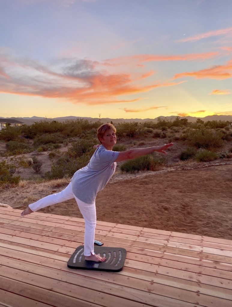 Shelley doing a yoga pose